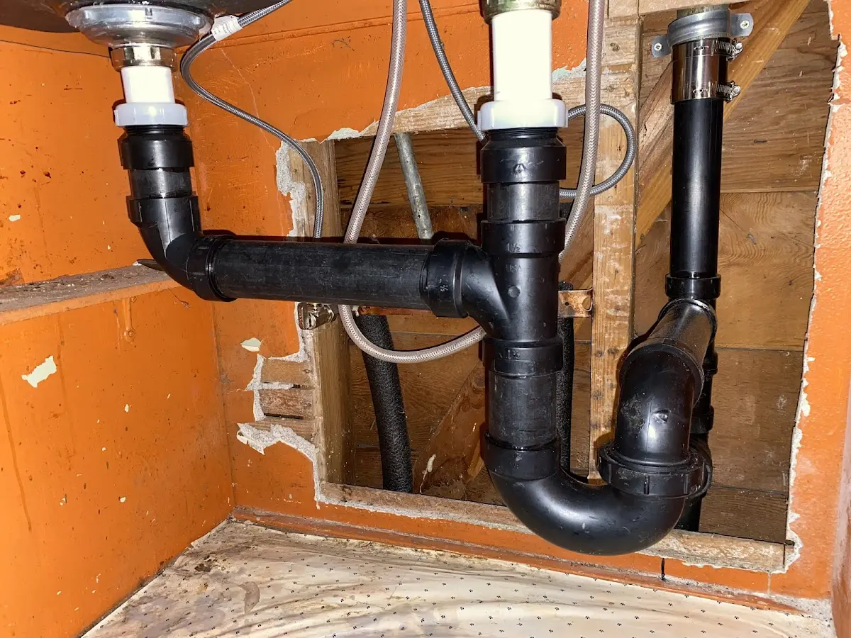 Professional Garbage Disposal Repair equipment and tools on the job in Kosciusko